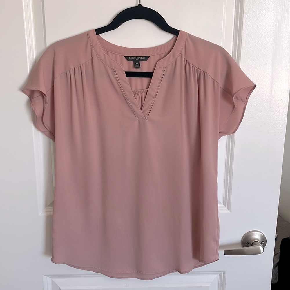 Blush V-neck blouse in lightweight, comfy chiffon fabric. Cute flutter sleeves